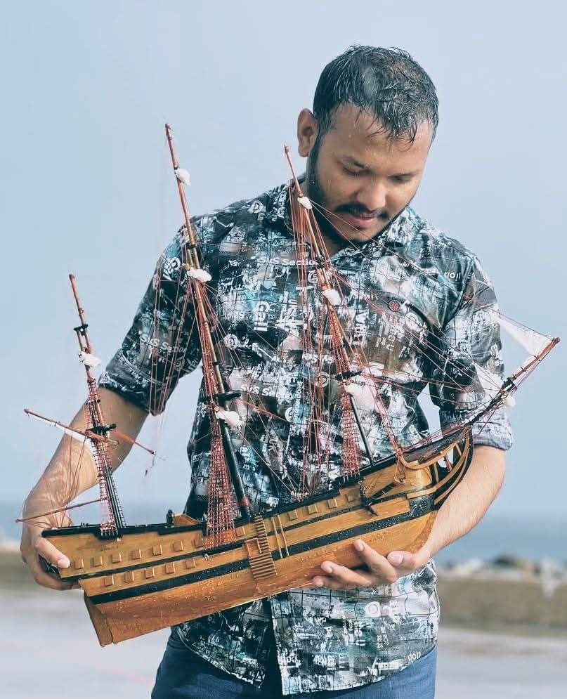 The maker — holding the Black Pearl